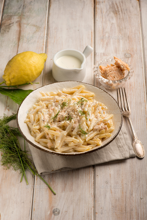 pasta with fresh salmon and cream sauce Stock Photo by